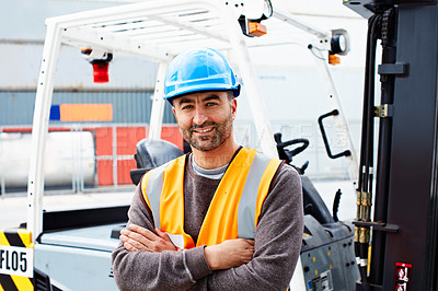Buy stock photo Portrait of a forklift operator working on a large commercial dock