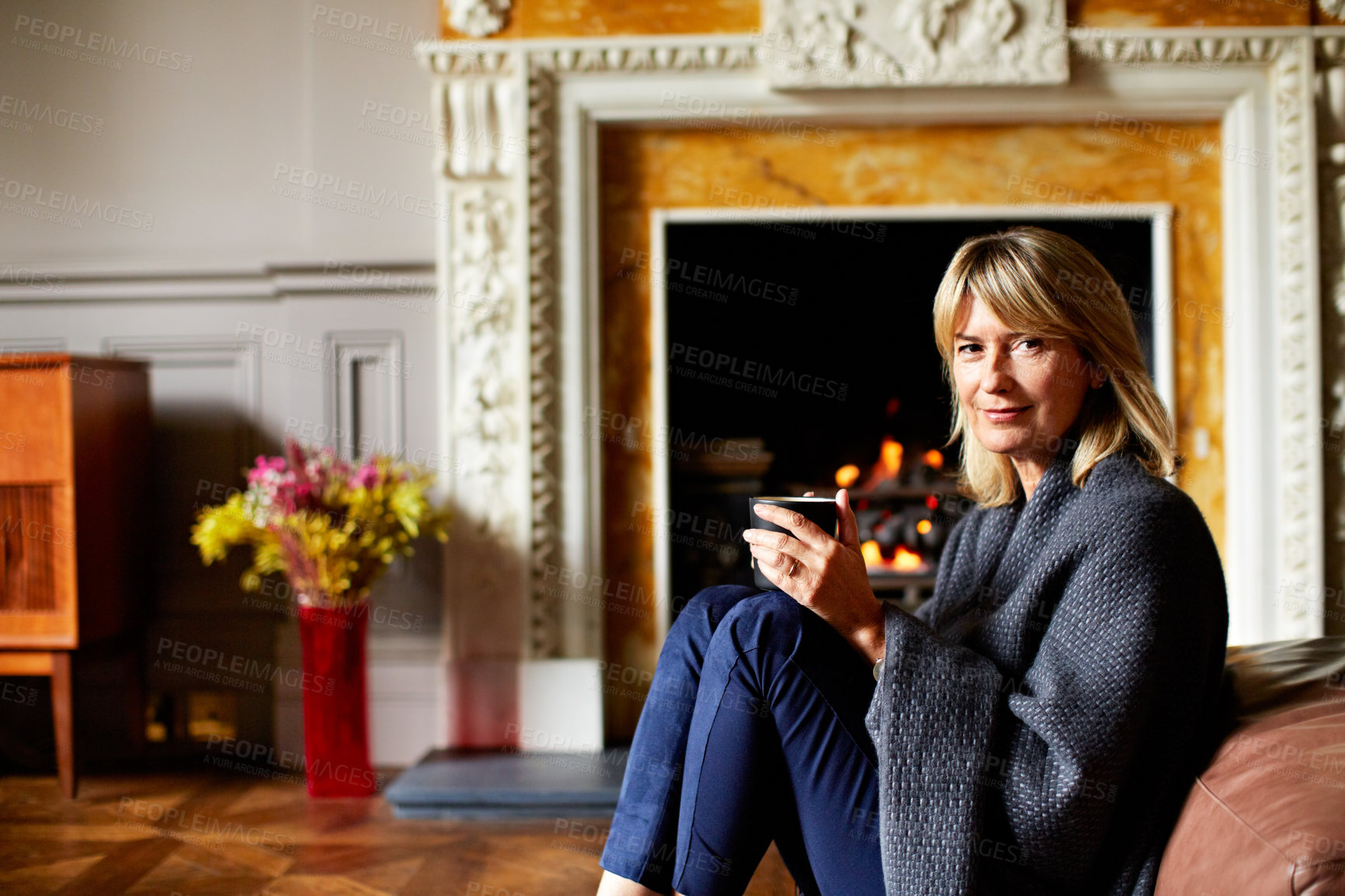 Buy stock photo Relax, portrait and woman in house with coffee, positive attitude and weekend break with unwind. Wellness, happy and mature person in lounge with warm drink, good mood and satisfaction on day off.