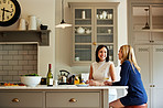 Enjoying a chat in the kitchen