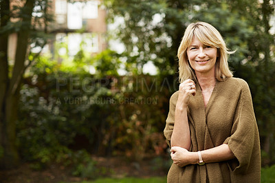 Buy stock photo Portrait of a mature woman standing outside