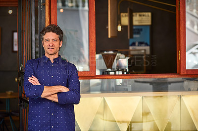 Buy stock photo Portrait of a man standing with his arms crossed in front of his cafe