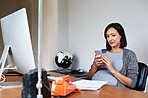 Checking her schedule before maternity leave