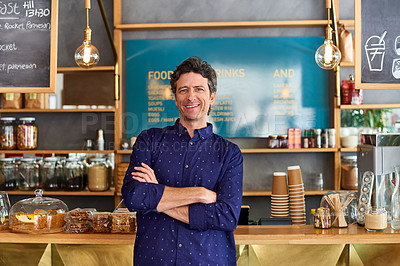 Buy stock photo Portrait of man standing in front of the counter in a cafe