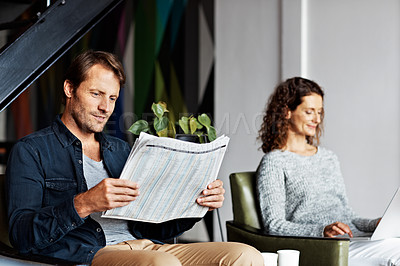 Buy stock photo Shot of a mature couple sitting at home