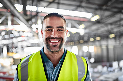 Buy stock photo Portrait of a warehouse worker standing in a large warehouse