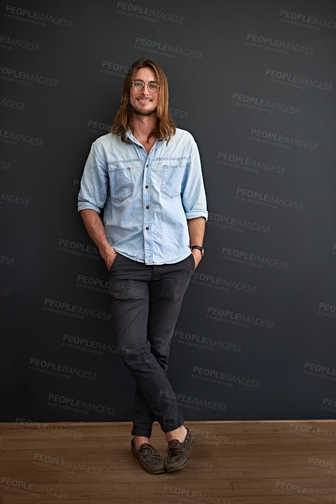 Buy stock photo Creative, portrait and man with smile in office, space and pride for publishing job and opportunity. Wall background, author and happy person with career development, media and confident in Canada