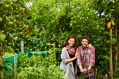 Buy stock photo Portrait of a smiling couple working in their organic garden