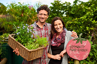 Buy stock photo Portrait of a smiling couple standing in their organic garden