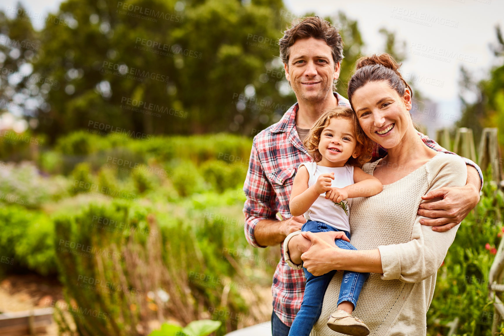 Buy stock photo Gardener, portrait and parents with child in garden, sustainable or bonding with girl in environment. Outdoor, plant growth and people with daughter in nature, happy and family connection in USA