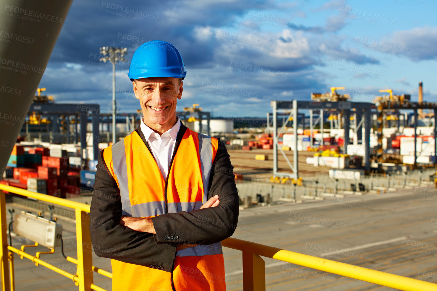 Buy stock photo Shot of a mature male warehouse worker working on a commercial dock