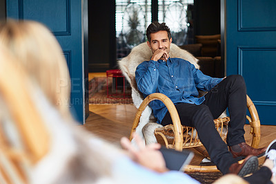 Buy stock photo Shot of a couple relaxing together on rocking chairs at home