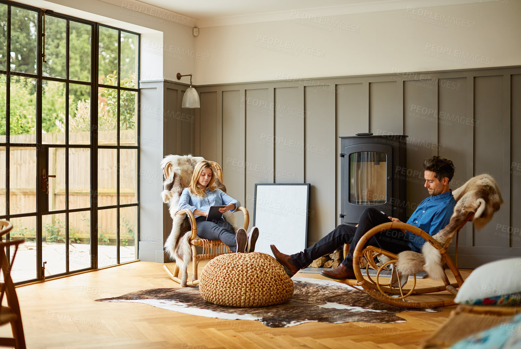 Buy stock photo Ebook, relax or couple in home with tablet, online storytelling or relationship hobby on day off. Digital, chill or people with tech, virtual literature or partner connection with weekend activity.