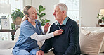 Blood pressure, healthcare and nurse with senior man in home for medical assistance, empathy or bonding. Happy, support and caregiver with elderly patient in retirement for checkup in living room.