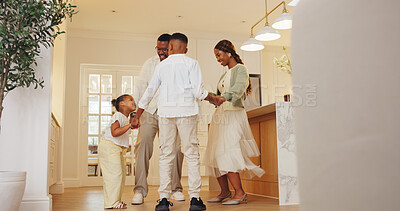 Buy stock photo Parents, dancing and holding hands with children in kitchen, bonding or celebration together in home. Family, rhythm and black people with smile on weekend, movement and connection with kids in house