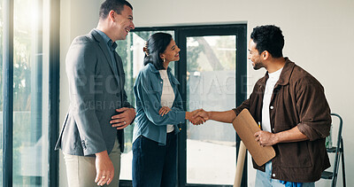 Buy stock photo Couple, handshake and meeting with contractor in new house for opportunity or renovation. Deal, project approval and shaking hands with happy people in real estate development for home improvement