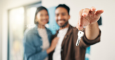 Buy stock photo Real estate, couple and hand in home with key, investment and fresh start with house remodeling. Property, renovation or people with purchase, housing success or moving achievement for new homeowners