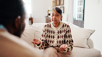 Buy stock photo Consulting, talking and therapy with old woman on sofa for mental health or trauma counseling. Conversation, diagnosis or feedback and senior person in session with therapist for assistance or help