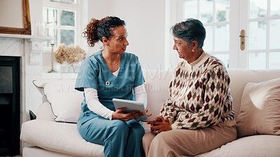 Buy stock photo Nurse, tablet and senior woman in house for medical diagnosis, checkup or health visit. Female person, caregiver or healthcare worker talking to patient on technology for elderly care in nursing home