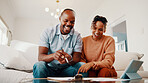 Documents, sofa and happy couple with finance in home for budget success, planning or report. Man, woman or smile with paperwork or tablet for financial profit, review or investment together in house