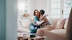 Sofa, nurse or woman with hug in home for healthcare assistance, trust or support for medical visit. Happy, female person or patient with smile or thank you for health service or checkup in house