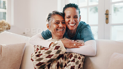 Buy stock photo Nurse, woman and hug in home for trust, support and happiness together with assisted living. Caregiver, mature person and embrace in lounge for homecare, medical healthcare or smile with portrait