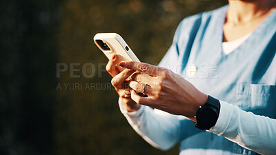Buy stock photo Phone, hands and nurse with medical app, online communication or telehealth report outdoor. Mobile, woman and healthcare worker at park for wellness news, email or treatment research with space