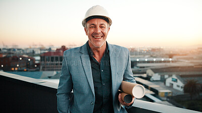 Buy stock photo Portrait, man and contractor with blueprint, inspector or engineering for urban infrastructure outdoor. Mature, person and architect on rooftop with sunset, quality control or city construction