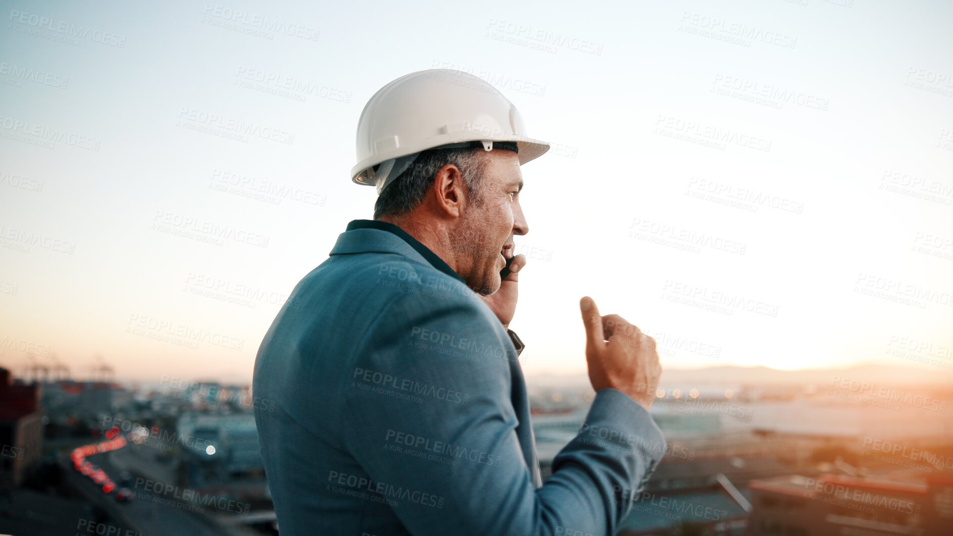 Buy stock photo Phone call, man and architect with project, sunset and engineer for urban infrastructure outdoor. Communication, mature person or space on rooftop with tech, quality control or city construction