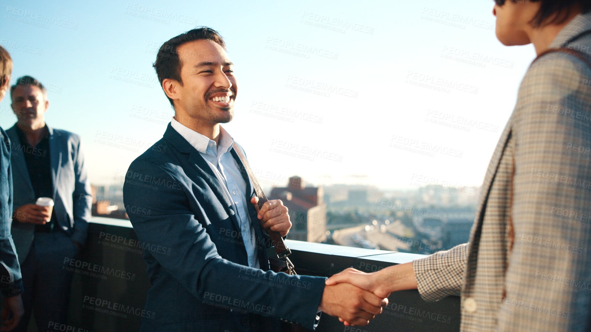 Buy stock photo Balcony, meeting and business people in city with handshake, property management agreement and deal. Happy, man and shaking hands outdoor with real estate agent, partnership and urban development.