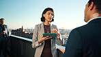Tablet, roof and business people with plan in city, real estate evaluation or urban development. Tech, outdoor and realtor team with conversation for property value, idea and listing suggestion