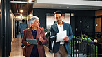 Walking, paperwork and man with manager on tablet for planning, agenda and update on finance report. Corporate, meeting and business people on tech for financial review, feedback and budget approval