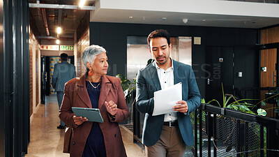 Buy stock photo Walking, paperwork and man with manager on tablet for planning, agenda and update on finance report. Corporate, meeting and business people on tech for financial review, feedback and budget approval