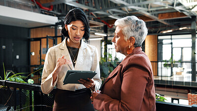 Buy stock photo Discussion, tablet and woman with manager in office for planning, meeting and update on finance report. Corporate, lobby and business women on tech for financial review, feedback or advice for budget