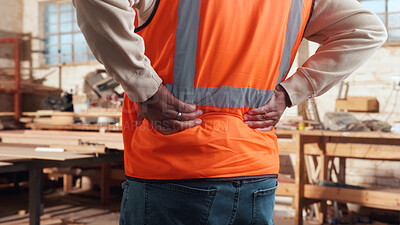 Buy stock photo Carpenter, hands and back pain in workshop with burnout, fatigue or repetitive stress injury in industry. Project manager, tired or man in woodworking factory with physical strain or muscle stiffness