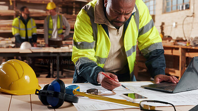 Buy stock photo Laptop, man and drawing in warehouse for blueprint, manufacturing and woodwork contractor. Paperwork, production and carpenter person in joinery factory with tech in workshop, draft or project