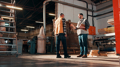 Buy stock photo Men, clipboard and discussion in lumber workshop, carpenter and supplier with timber delivery. Conversation, collaboration and people with checklist, feedback and woodworking inventory management