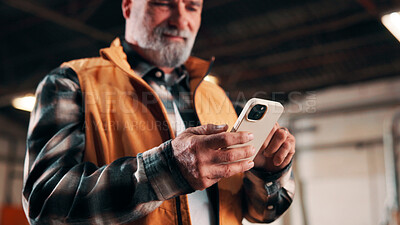 Buy stock photo Carpentry, hands and phone with man in factory for management of agenda or schedule. App, manufacturing and production feedback with mature person in woodworking warehouse for furniture business