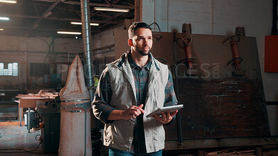 Buy stock photo Man, carpenter and inventory with tablet in warehouse for wood production or stock check. Male person, carpentry or inspection with technology for timber business or lumber distribution in workshop