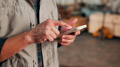 Buy stock photo Carpentry, hands and phone with man in workshop for communication, feedback or research. App, production and text message with person in woodworking factory for update on furniture manufacturing