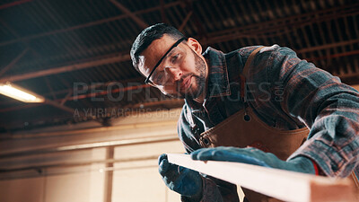 Buy stock photo Carpentry, sanding or man in factory with wood, fabrication or quality control in furniture production. Below, ppe or carpenter with plank, timber polishing or manufacturing process in woodworking.