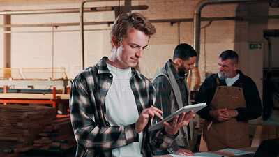 Buy stock photo Man, carpenter and team with tablet in warehouse for wood production or furniture business. Male person, inventory or checking stock with technology for lumber supply or timber schedule in workshop