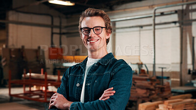 Buy stock photo Portrait, carpenter and happy man with arms crossed in workshop for wood production or service. Male person, confidence or carpentry worker with smile in manufacture for timber or lumber distribution