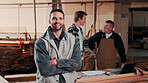 Man, portrait and carpenter in factory with arms crossed, lumber production or happy for opportunity. Project manager, smile and team in workshop for about us, small business representative or timber