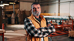 Arms crossed, carpentry and portrait of man in warehouse for design, management or storage. Manufacturing, production and serious with mature person in woodworking factory for furniture business