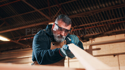 Buy stock photo Carpentry, sanding or man in warehouse with wood, fabrication or quality control in furniture production. Below, ppe or carpenter with plank, timber polishing or manufacturing process in woodworking.