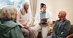 Senior people, caregiver and discussion with clipboard for support, healthcare and retirement. Patients, volunteer and therapy with checklist for nursing home, rehabilitation and elderly medical care