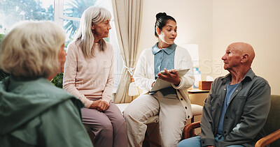 Buy stock photo Senior people, caregiver and discussion with clipboard for support, healthcare and retirement. Patients, volunteer and therapy with checklist for nursing home, rehabilitation and elderly medical care