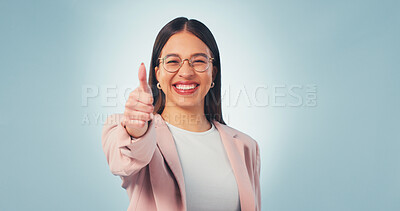 Buy stock photo Business, woman and thumbs up portrait in studio with happy review, like or approve on blue background. Professional, feedback or hand gesture with corporate person by space for agreement or yes