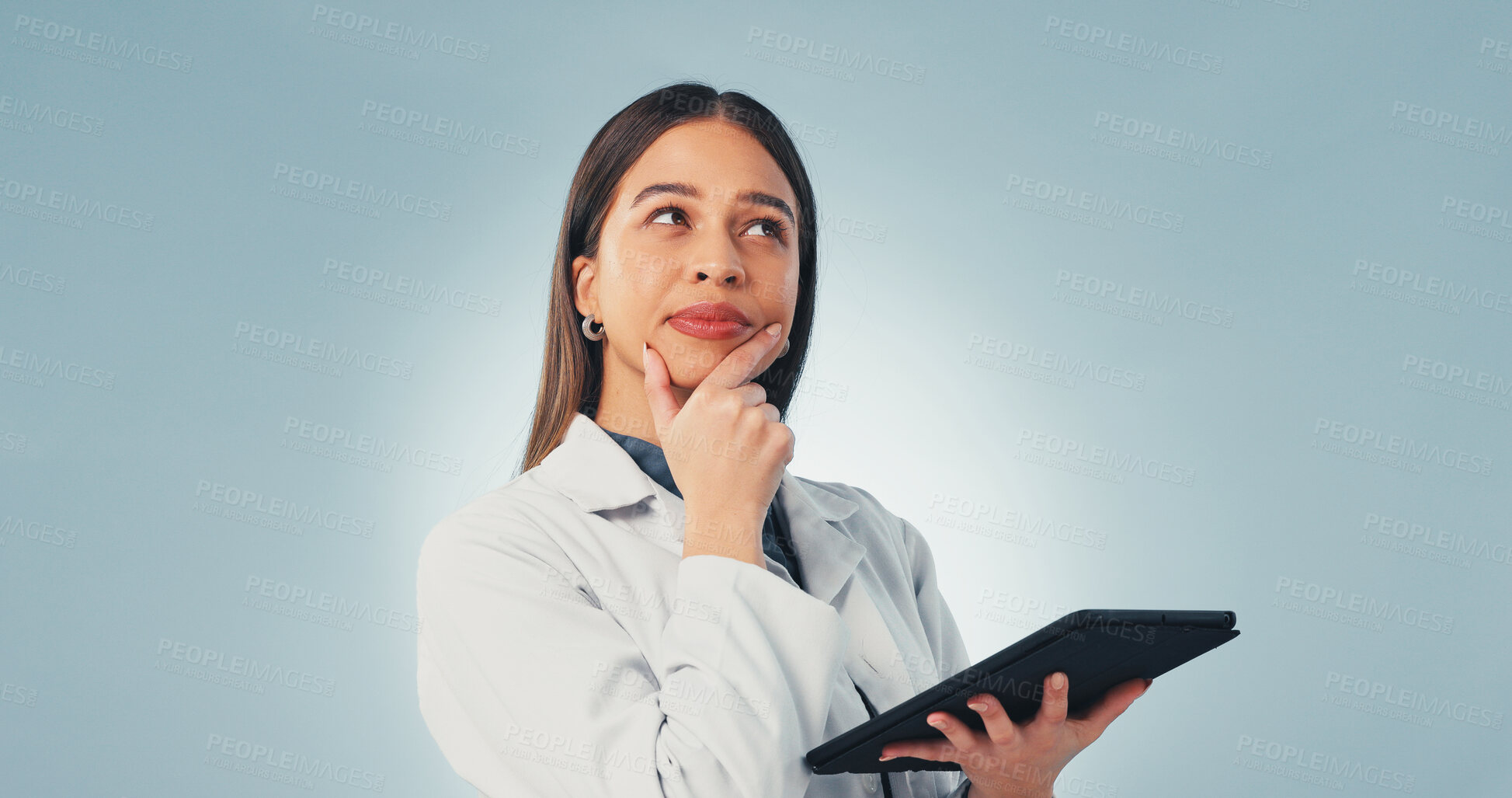 Buy stock photo Tablet, thinking and scientist in studio with medical research, innovation or pharmaceutical report. Tech, woman and space with ideas for science study, healthcare or planning on blue background.