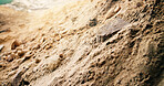 Rubble, sand and dirt on construction site for building project, renovation and engineering materials. Outdoor, structure repair and industrial development with dust, soil and debris from demolition.